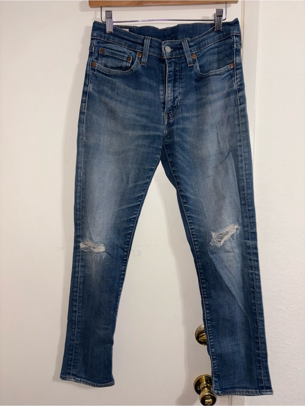Levi's 511 Slim Fit Jeans featuring a faded Blue Distressed Leather Patch 31x32